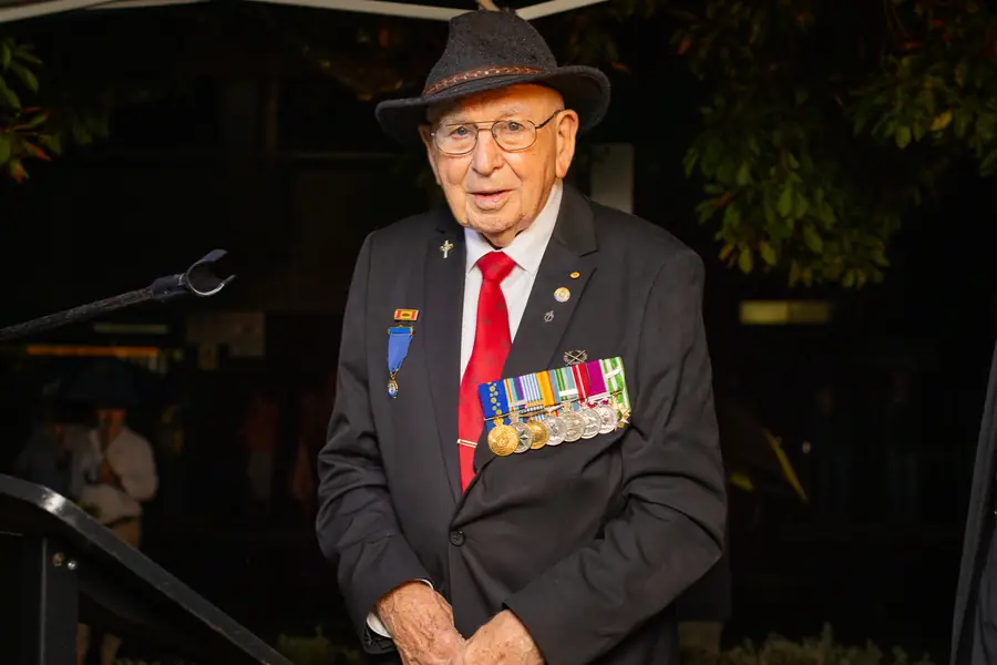 A decorated veteran speaks at the dawn service.