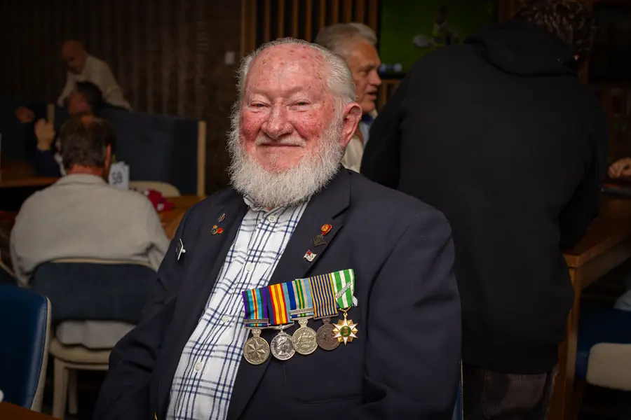 A veteran with his medals at the ANZAC Day gathering.